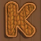 cornelius-milk-hunter-megaways-slot-orange-k-symbol